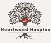 A logo of heartwood hospice